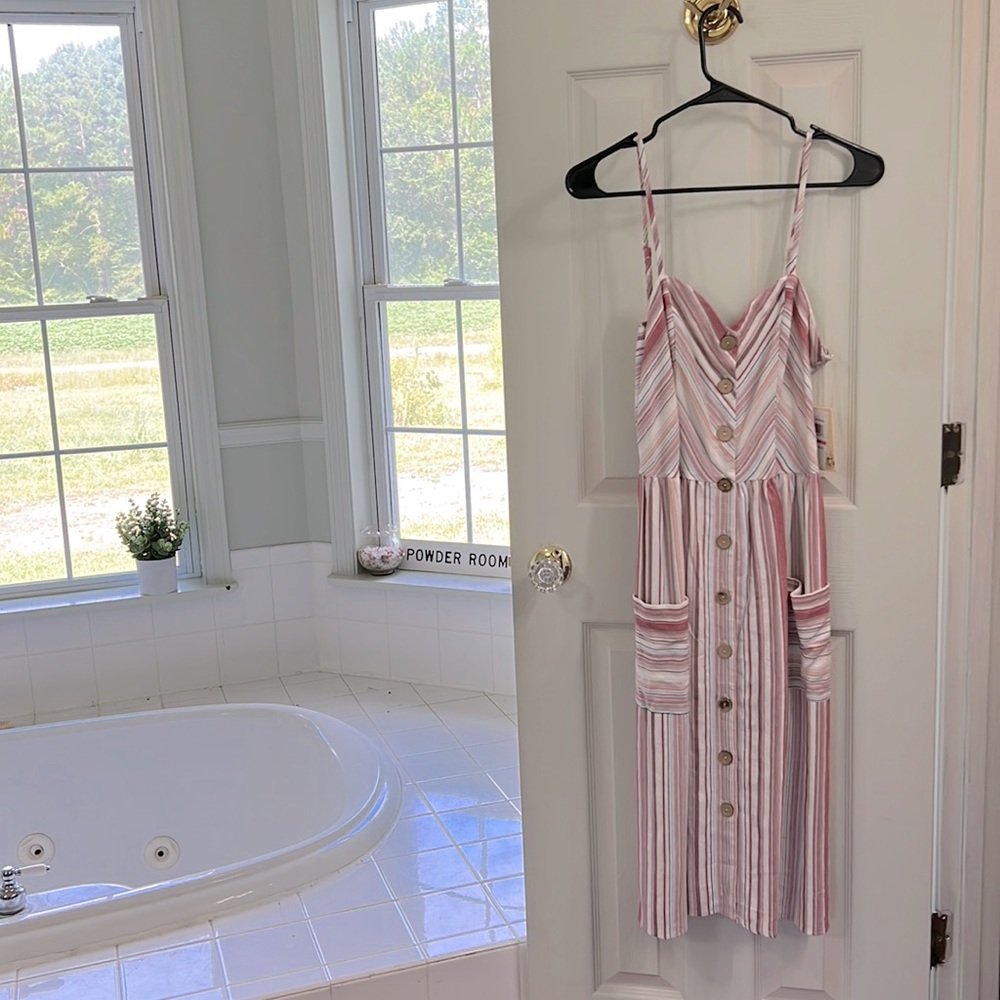 Strappy midi button down dress. Striped pattern dark teal, reds, pinks. Pockets